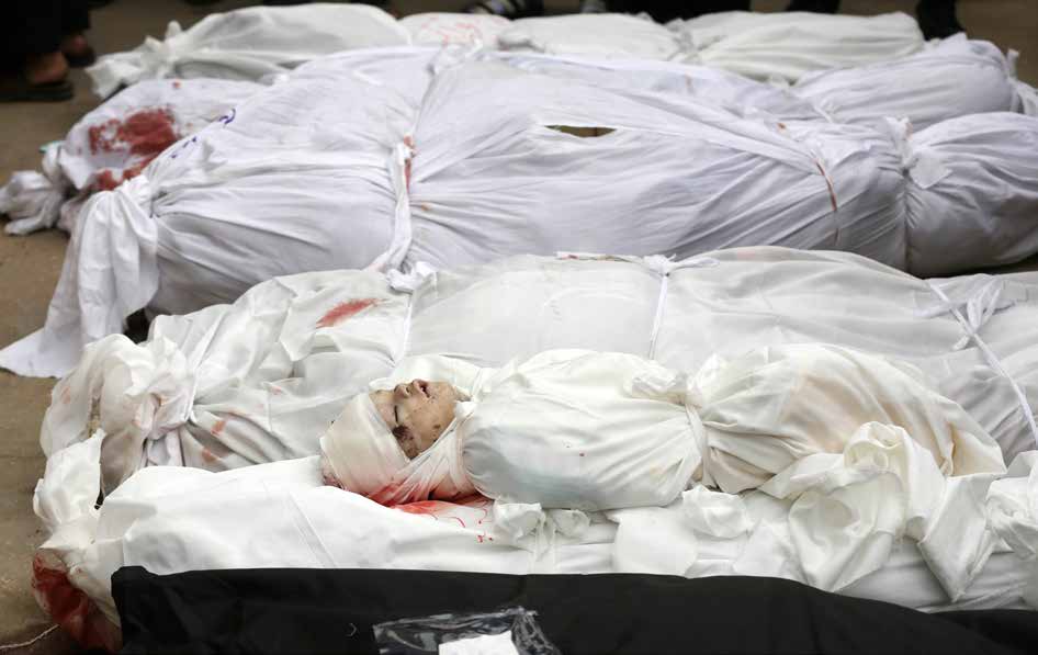 Relatives collect the bodies of Palestinians killed in an Israeli airstrike on the Nuseirat Refugee Camp in Deir al-Balah to prepare them for funeral prayers and burial. The attack, carried out by the Israeli military on March 16, 2024, was part of a night of intense bombardment that killed at least 80 Palestinians. According to Gaza’s Media Office, Israeli forces targeted at least 12 homes overnight. Numerous civilians were also injured in the strikes on residential buildings across the Gaza Strip.